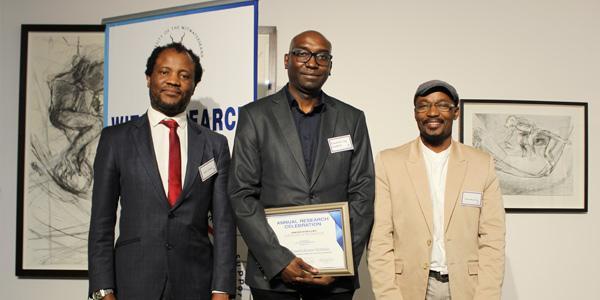 VC Prof. Zeblon Vilakazi with top postgraduate supervisor in the Faculty of Commerce, Law and Managment, Prof. Kambidima Wotela, and Prof. Robert Muponde, left, Director Postgraduate Affairs 600x300